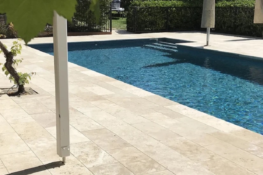 The Best Outdoor Applications of Travertine in Mediterranean Homes: Patios & Pool Surrounds