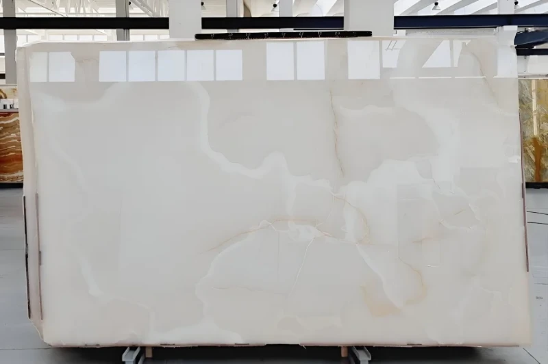 Marble quarry extraction process showing large blocks being cut